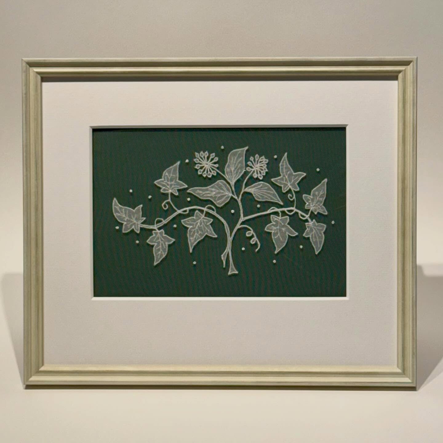 A delicate piece of lace work, floating off the green, appropriate for this time of year.