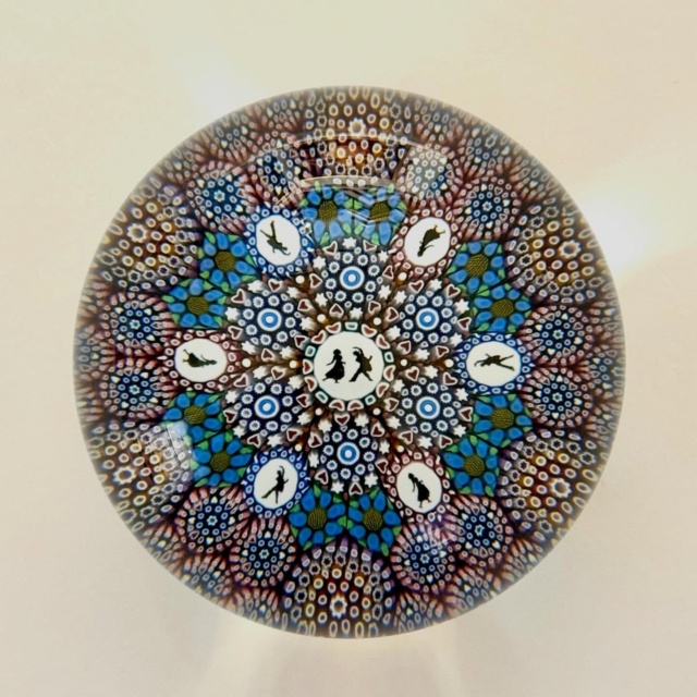 Dancing silhouette cane paperweight by Twists Glass