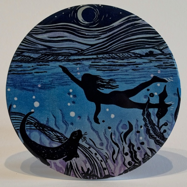 “Swimming with otters”, coaster by Caroline Knox